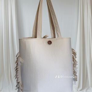 Chic Beige Tote with Fringe Detailing